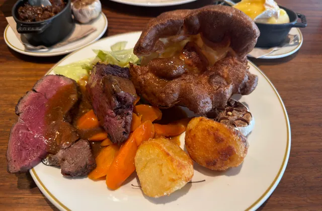Original photo of roast beef, Yorkshire pudding, roast potatoes, carrots and cabbage at Hawksmoor.